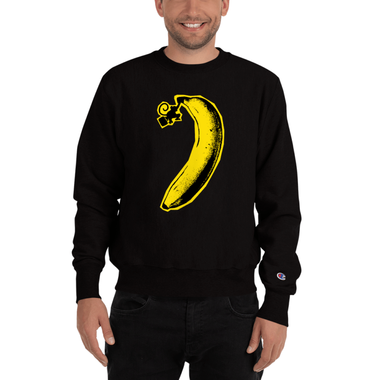 Smiling man wearing a black sweatshirt featuring a large yellow banana graphic on the front.